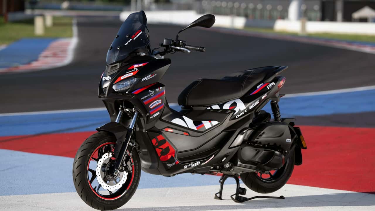 This Aprilia scooter proudly sports a MotoGP livery and is loud.